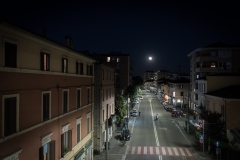 Bologna, 7 maggio 2020. Il fenomeno della superluna rischiara una via Emilia vuota a causa delle restrizioni, ancora presenti, dovute al contenimento del contagio Covid-19.